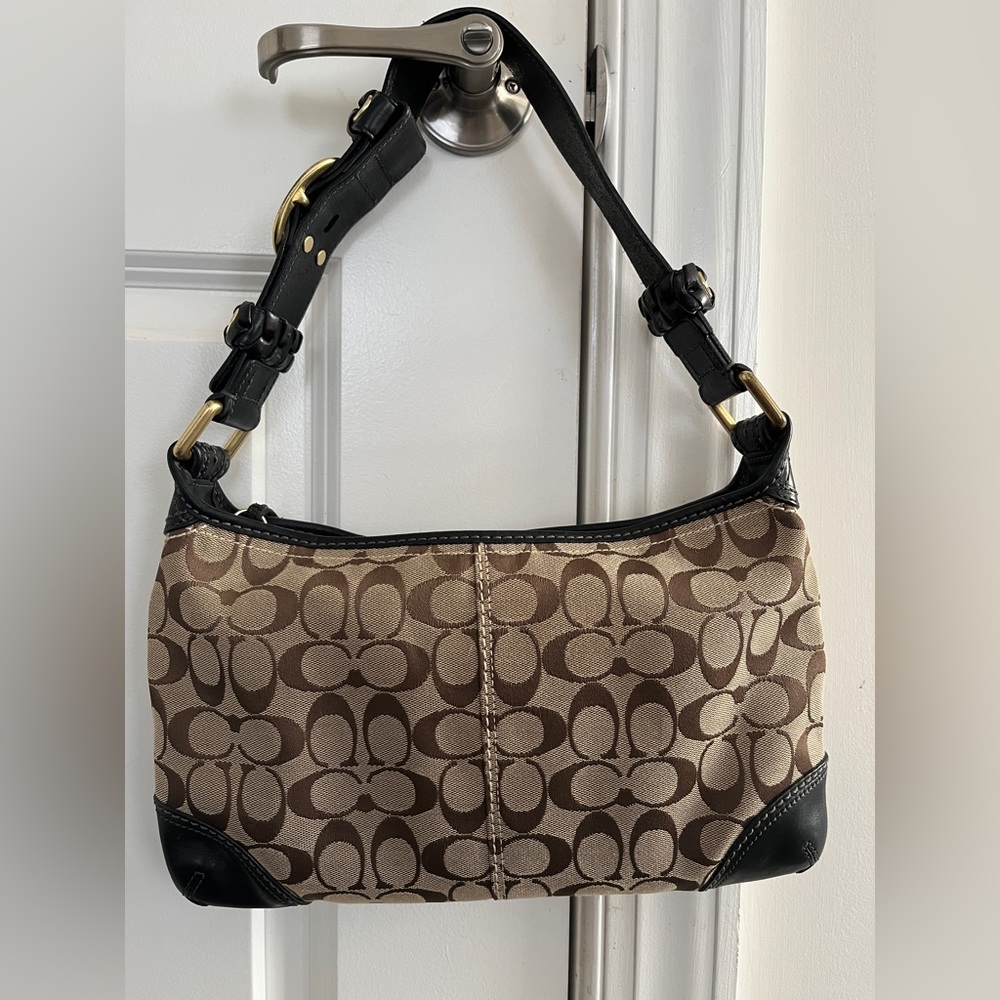 Coach shoulder bag. Tan C monogram w/ black trim. Excellent condition.